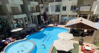 Spacious Paradise Hill Apartment 2BRâ Ideal for Big Families - WIFI - Pool