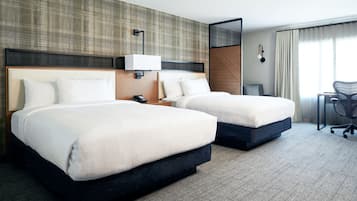 Hypo-allergenic bedding, pillow-top beds, desk, laptop workspace