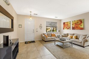 House | Living area | 55-inch Smart TV with digital channels, foosball, streaming services