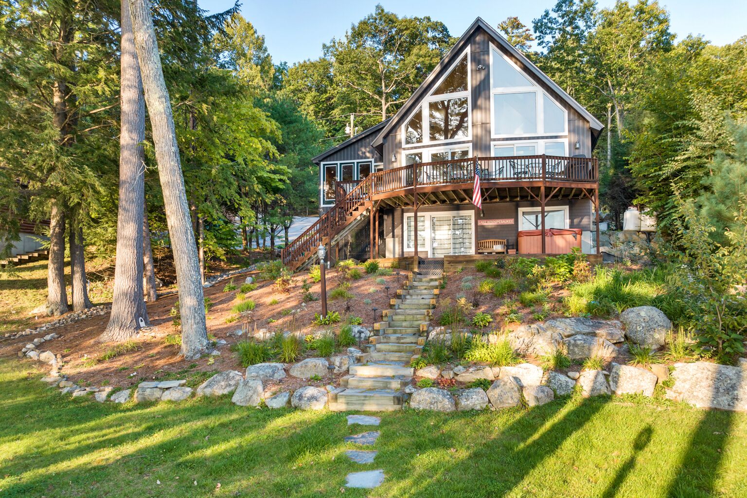 Adirondack style Winnipesaukee waterfront home with 4 bedrooms and SW EXP
