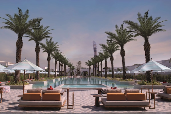 Outdoor pool, pool umbrellas, sun loungers