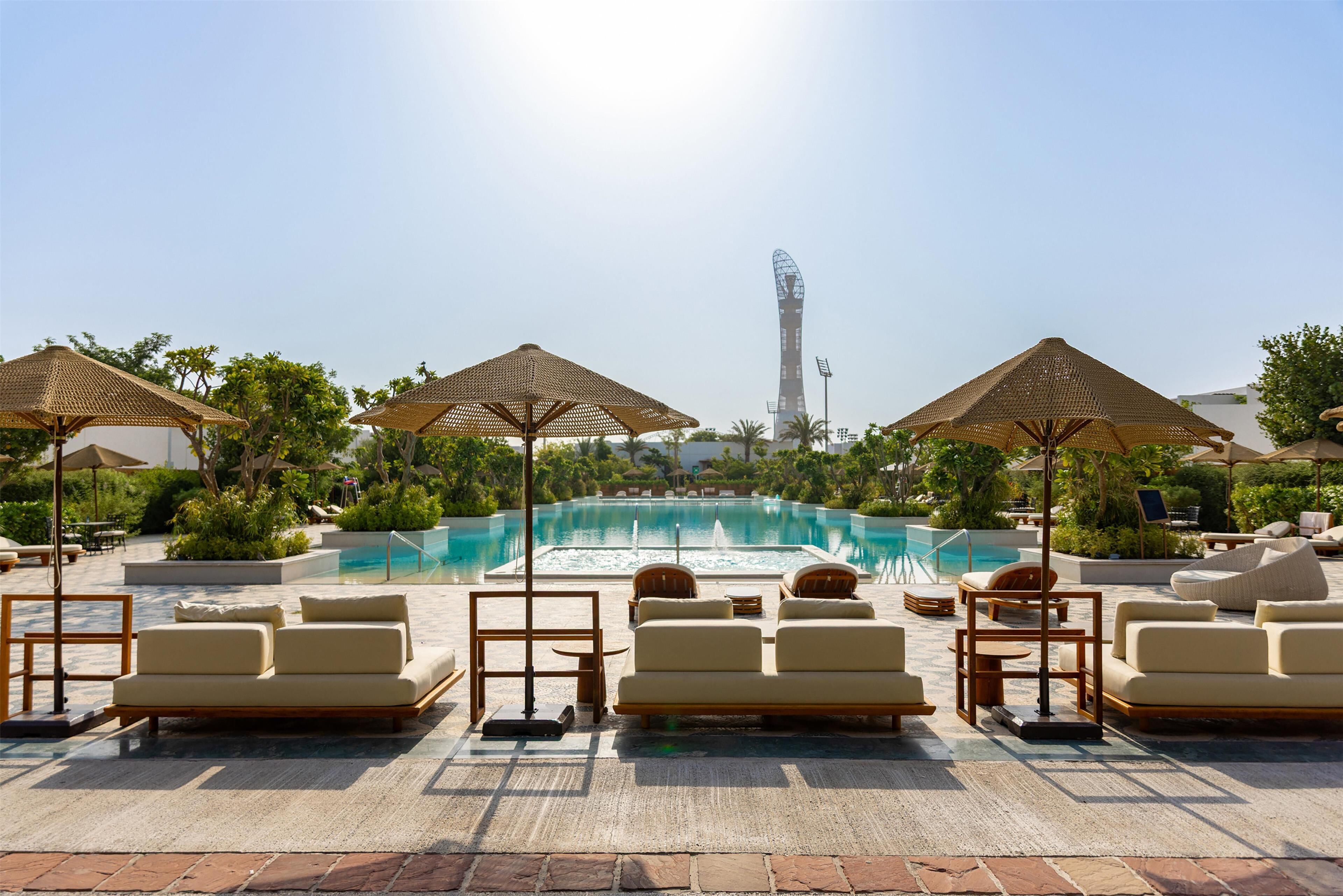 Outdoor pool, pool umbrellas, sun loungers
