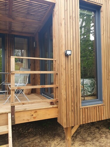 Comfortable wooden bungalow among the trees