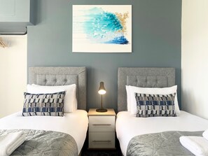 2 dormitorios, tabla de planchar con plancha, wifi gratis y ropa de cama