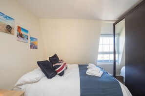 2 dormitorios, tabla de planchar con plancha, wifi gratis y ropa de cama