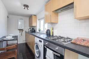 Fridge, microwave, oven, cookware/dishes/utensils