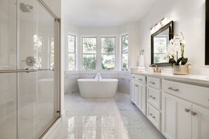 Bathtub, hair dryer, towels