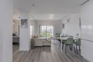 Appartement | Coin séjour | Télévision LCD de 40 pouces avec chaînes par câble, télévision