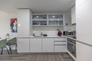 Apartment | Private kitchen | Full-sized fridge, microwave, oven, stovetop
