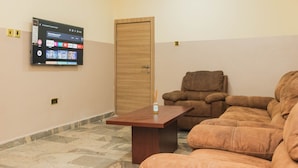 Executive Suite | Desk, laptop workspace, WiFi (free), individually decorated - J's Place (Abuja)