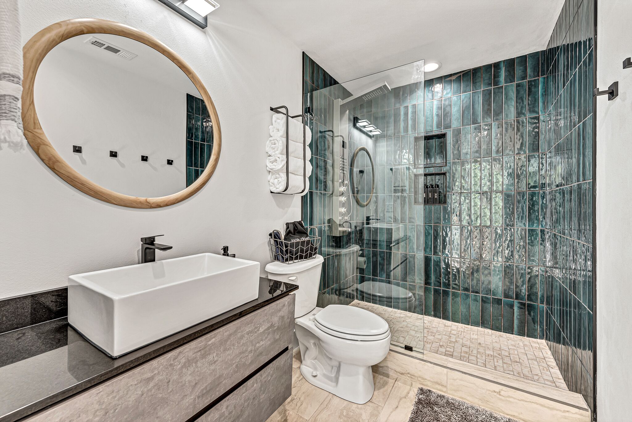 Shower, hair dryer, towels, soap