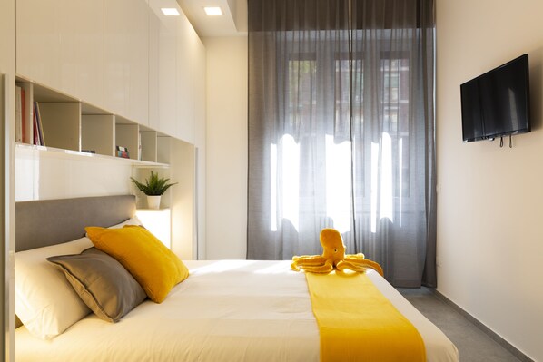 Departamento | 1 habitación, tabla de planchar con plancha, wifi gratis y ropa de cama 