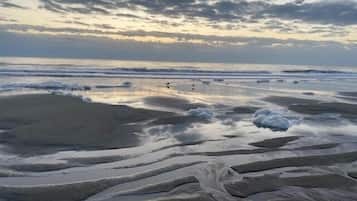 On the beach, sun-loungers, beach towels