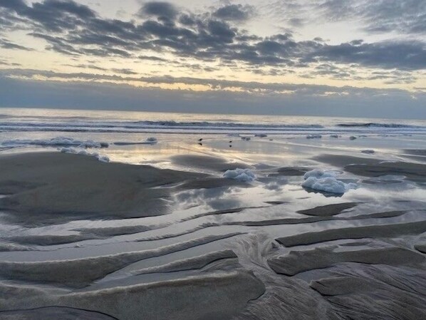 On the beach, sun-loungers, beach towels