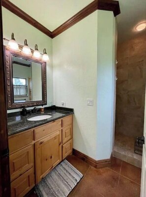 Bathtub, towels, soap, shampoo