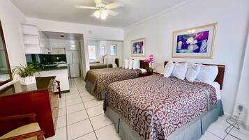 Comfort Room | Pillow-top beds, desk, laptop workspace, free cots/infant beds