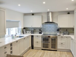 Dishwasher, high chair, cookware/dishes/utensils