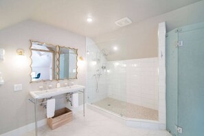 Bathtub, hair dryer, towels, soap