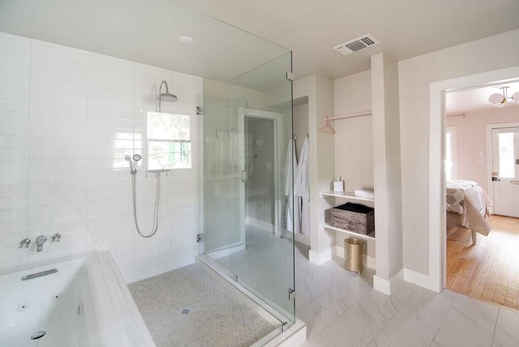 Bathtub, hair dryer, towels, soap