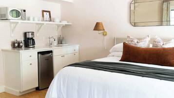 1 habitación, tabla de planchar con plancha, cuna de viaje y wifi