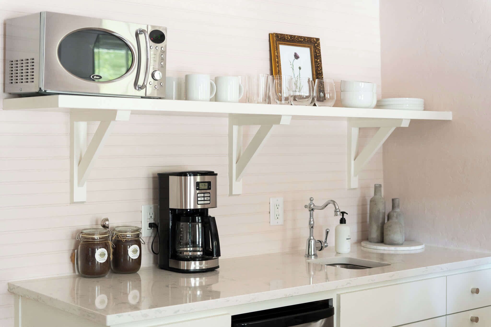 Coffee/tea maker, fridge, microwave, toaster