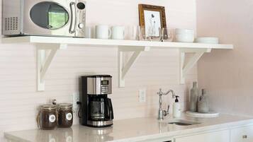 Coffee/tea maker, fridge, microwave, toaster
