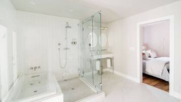 Bathtub, hair dryer, towels, soap