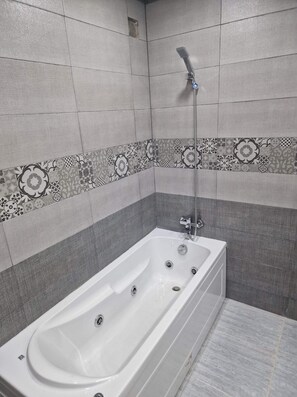 Een douche, een bubbelbad