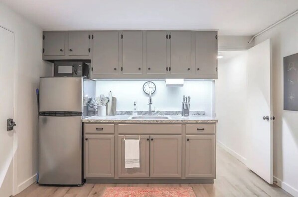 Fridge, microwave, coffee/tea maker, toaster