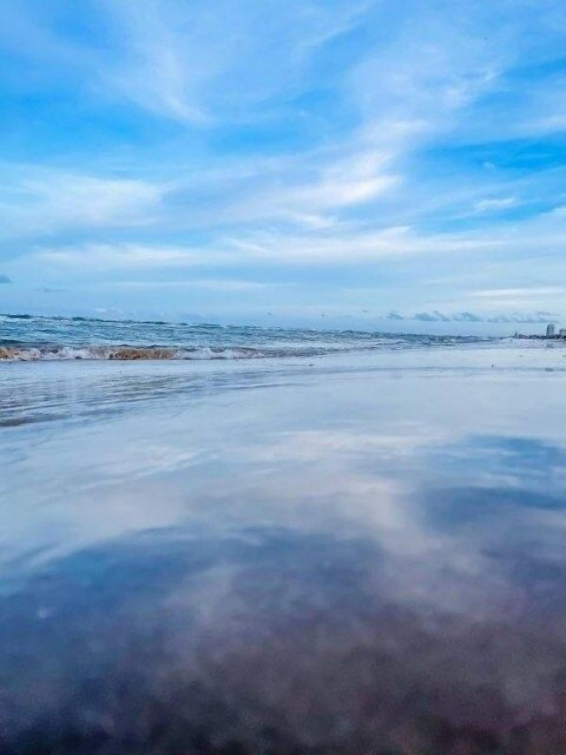 Nær stranden og strandhåndklær