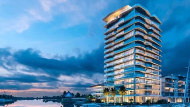 A multi-story hotel with balconies, located near a body of water. - CONDO NAUTICO BY TRVL2HM (Puerto Vallarta)