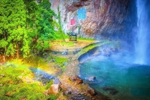A serene natural setting with a waterfall, a small wooden structure, and a clear stream. - House 67, Yandang Mountain (Yueqing)