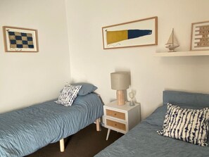 3 bedrooms, desk, iron/ironing board, travel crib