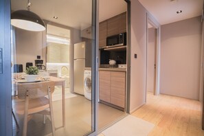 Two Bedroom | Private kitchen | Fridge, microwave, oven, coffee/tea maker - VOQUE Hotel & Serviced Residence Sukhumvit 51 (Bangkok)