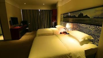 Desk, blackout drapes, bed sheets