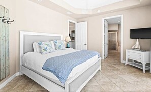 A bedroom with a bed, a TV, a dresser, and a door leading to another room.