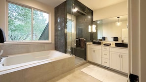 Combined shower/tub, hair dryer, towels, soap