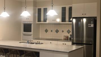 Fridge, stovetop, electric kettle, toaster