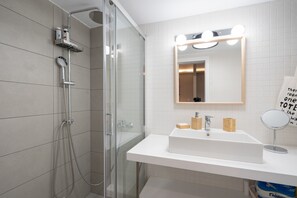 Bathtub, hair dryer, toilet paper