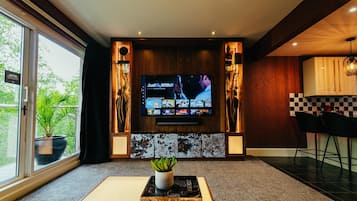 Romantic House, 1 King Bed (Entire Home) | Living area | 50-inch flat-screen TV with digital channels, TV, fireplace