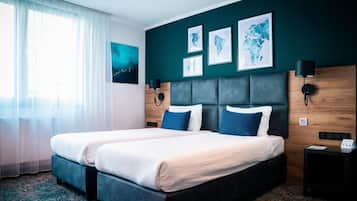 Literie hypoallergénique, coffres-forts dans les chambres, bureau