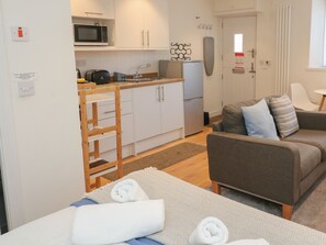 Fridge, toaster, cookware/dishes/utensils