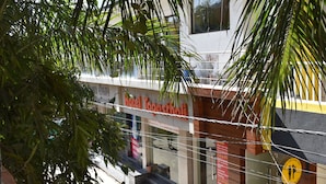 A hotel with a sign reading "Hotel Topasthali" and a visible staircase leading to the entrance. - Tapasthali By Meera Hotels (Narendranagar)