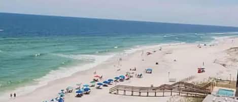 On the beach, sun-loungers, beach towels