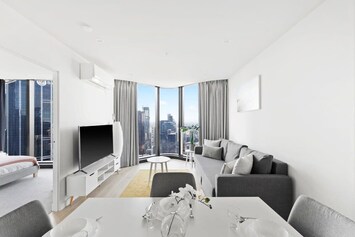 A spacious living with a 3-seater sofa bed that folds out to a double.