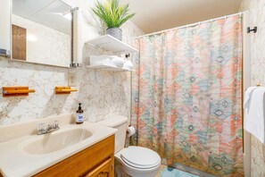 Bathtub, hair dryer, towels