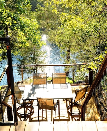 Outdoor dining. Nichols Hole Cabin - Above the Caddo River - Float to your Cabin!