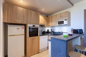 Réfrigérateur, micro-ondes, four, lave-vaisselle