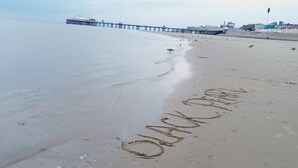A beach with the words "BLACK RIM" written in the sand. - Black Pearl Luxury Apartments (Blackpool)