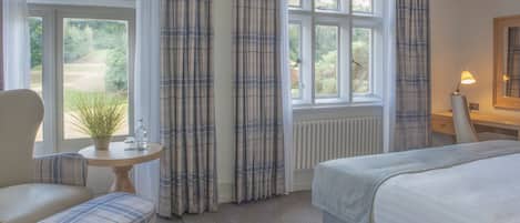Premium Double Room, Garden View | In-room safe, desk, laptop workspace, iron/ironing board